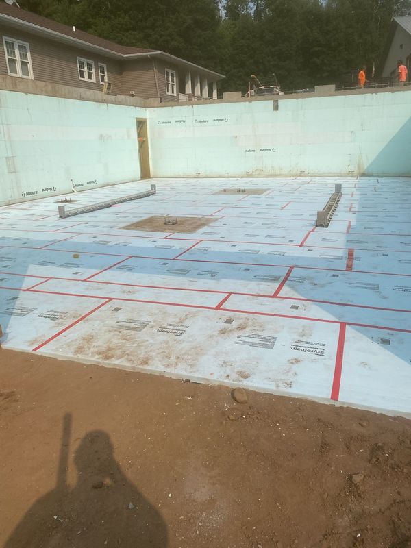 Nudura ICF walls with underslab insulation