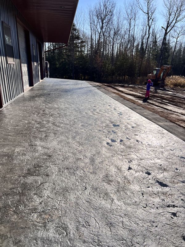 Large stamped concrete apron with Oxford Slate pattern