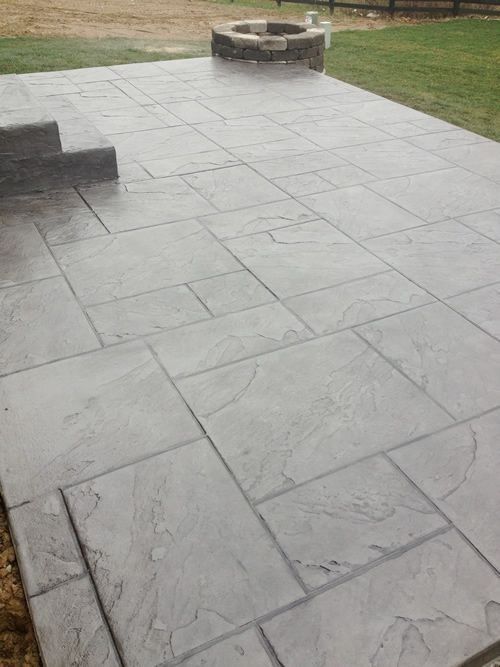 Finished stamped slate patio with fire pit